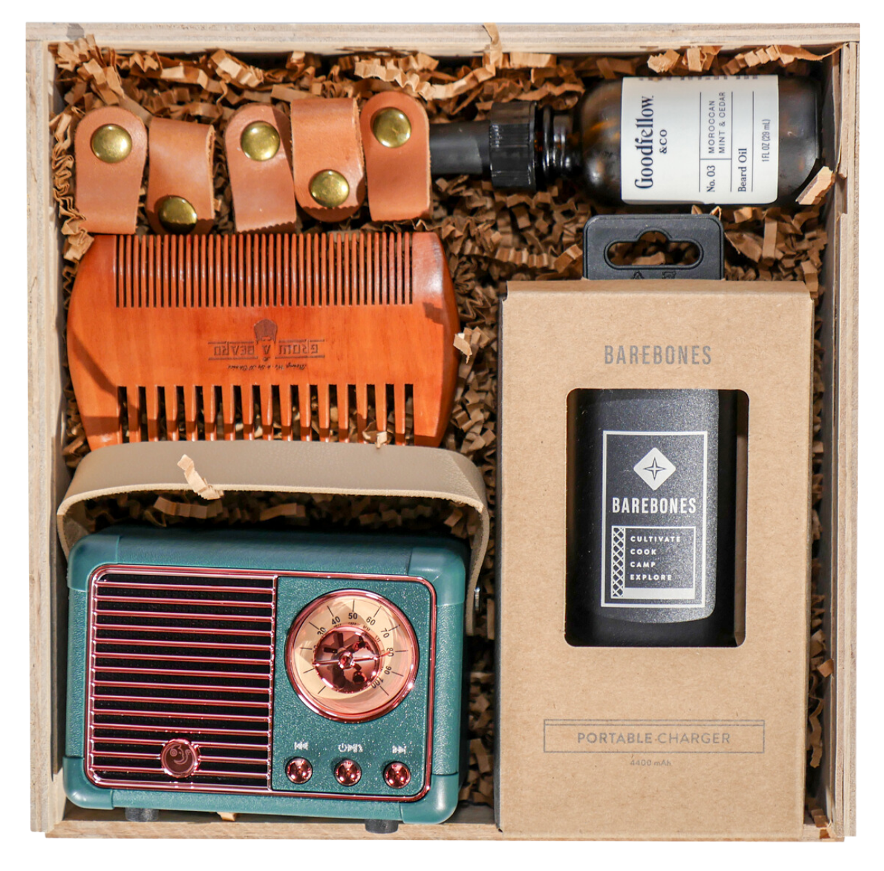 A personal gift with a retro radio, a portable charger and grooming accessories arranged in a wooden box